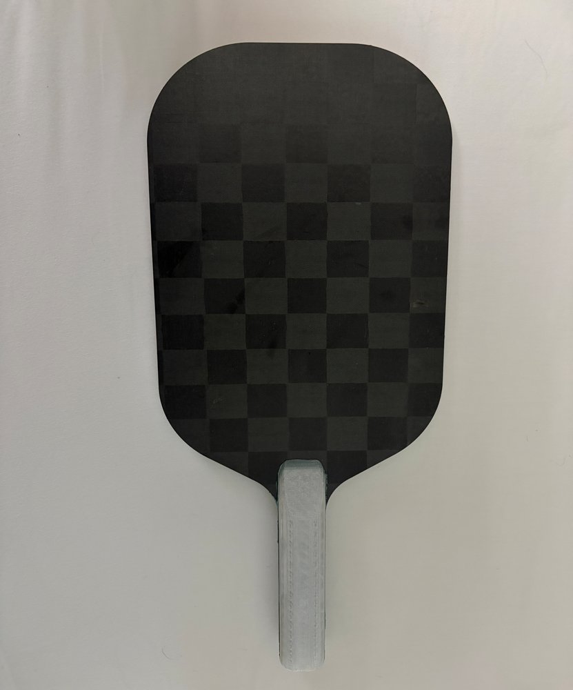 Finished carbon fiber pickleball paddle